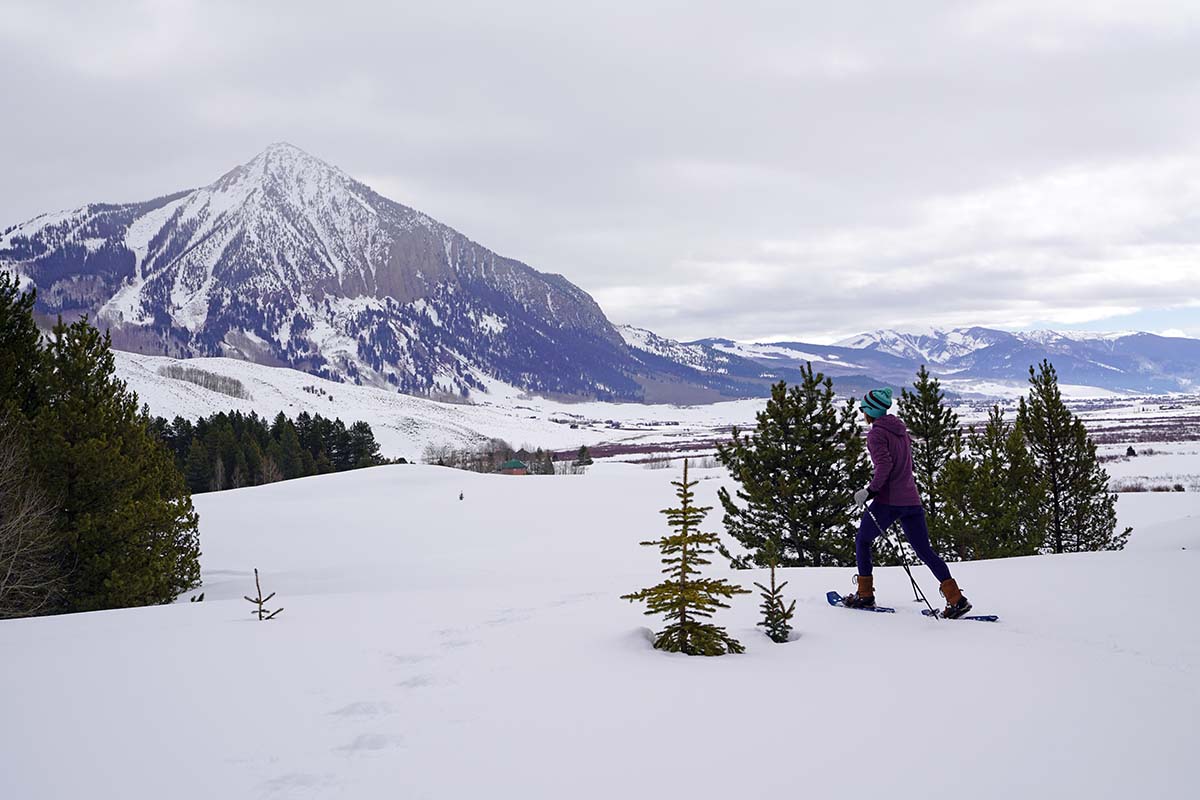 MSR Evo Trail snowshoes (hiking with mountain in background)