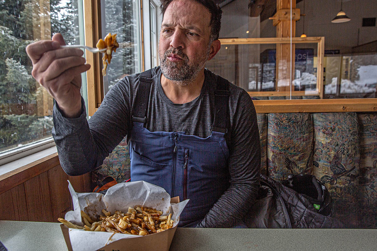 Outdoor Research Kulshan Storm Bibs (eating food at lodge)